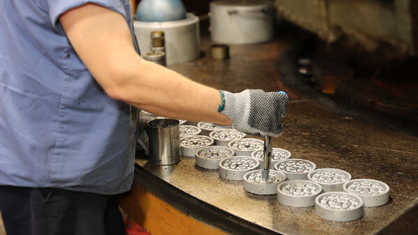 Employee Pouring Liquid Polyurethane for Cast Polyurethane Products