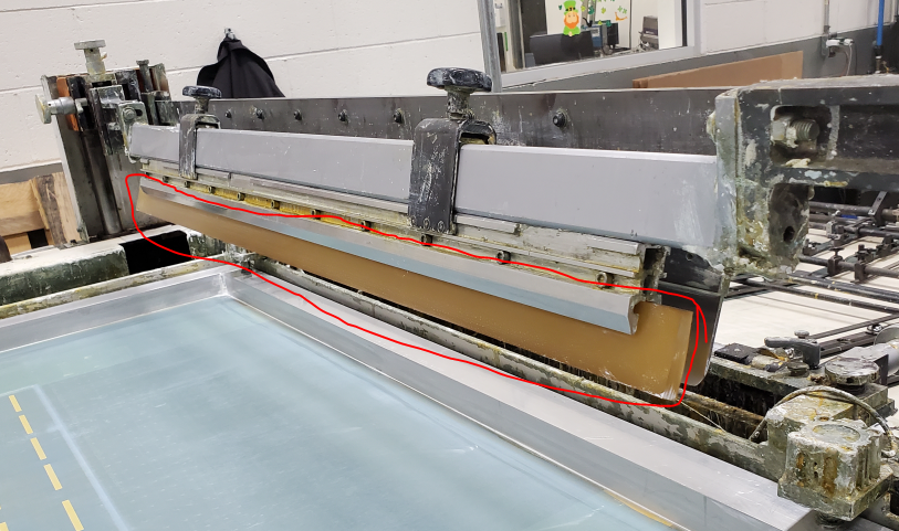 Polyurethane Screen Printing Squeegees highlighted on screen printing machine